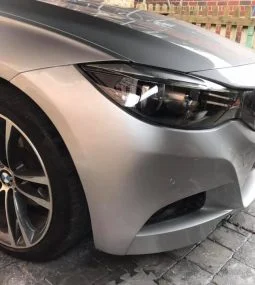 Front bumper after professional scratch repair