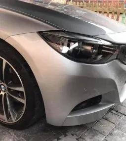 Front bumper after professional scratch repair