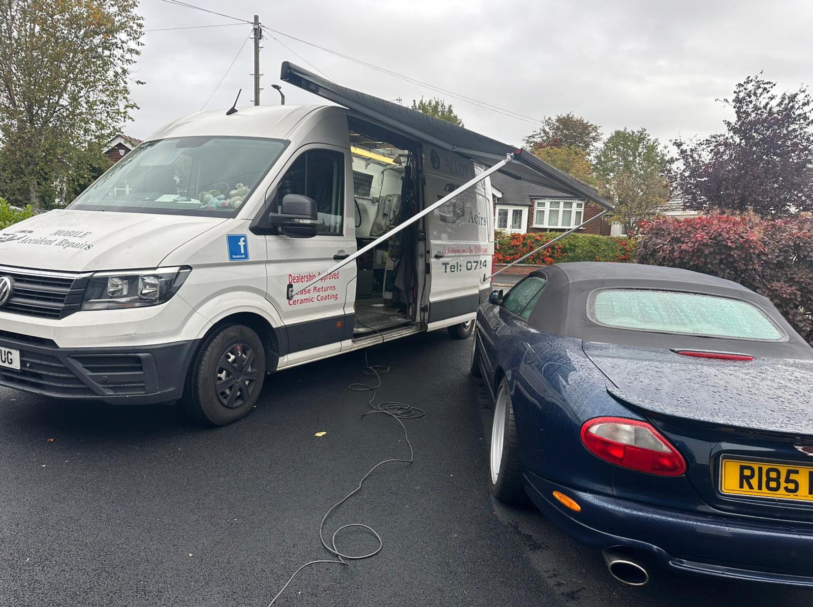 Mobile car body repair service in Manchester driveway