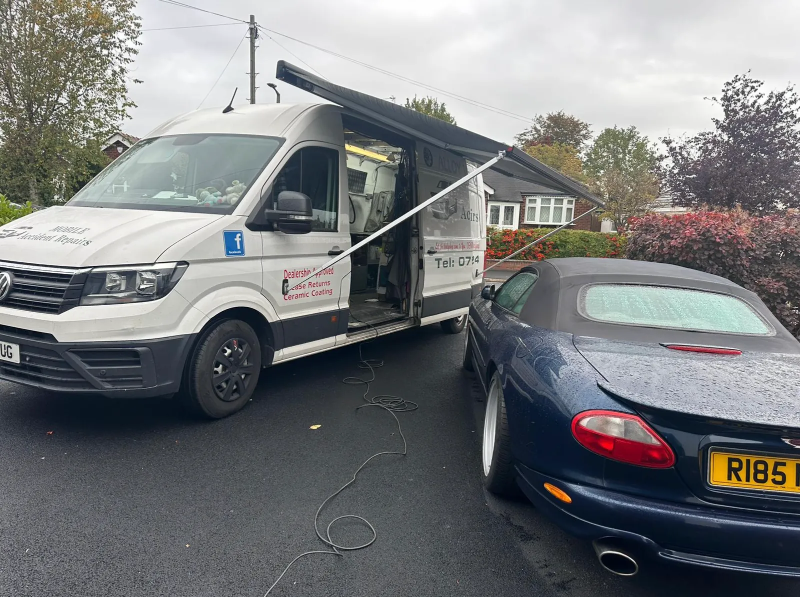 Mobile car body repair service in Manchester driveway